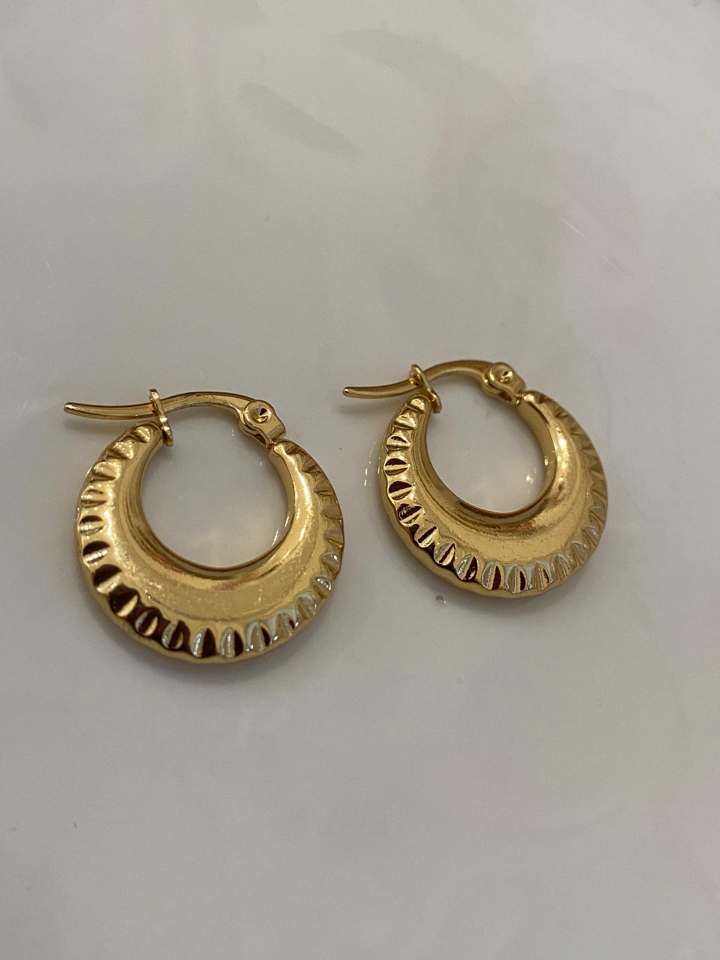 Zarcillos de acero