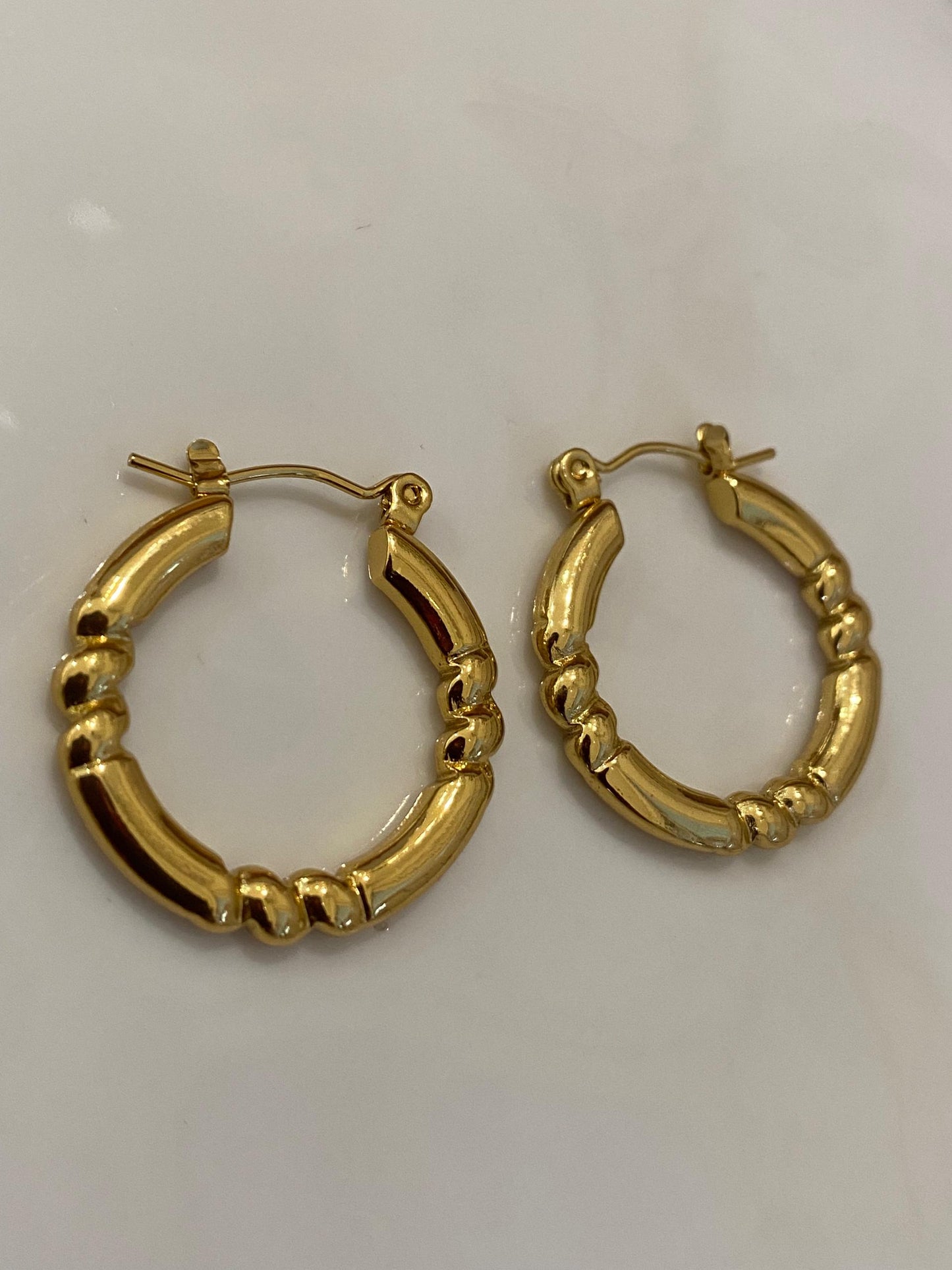Zarcillos de acero