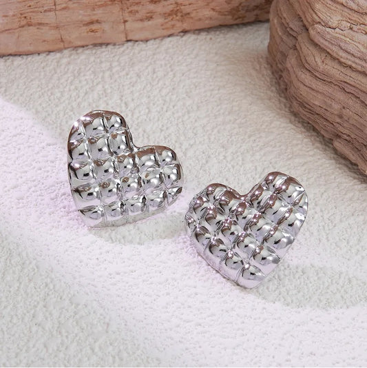 Zarcillos plateados de acero - Corazones